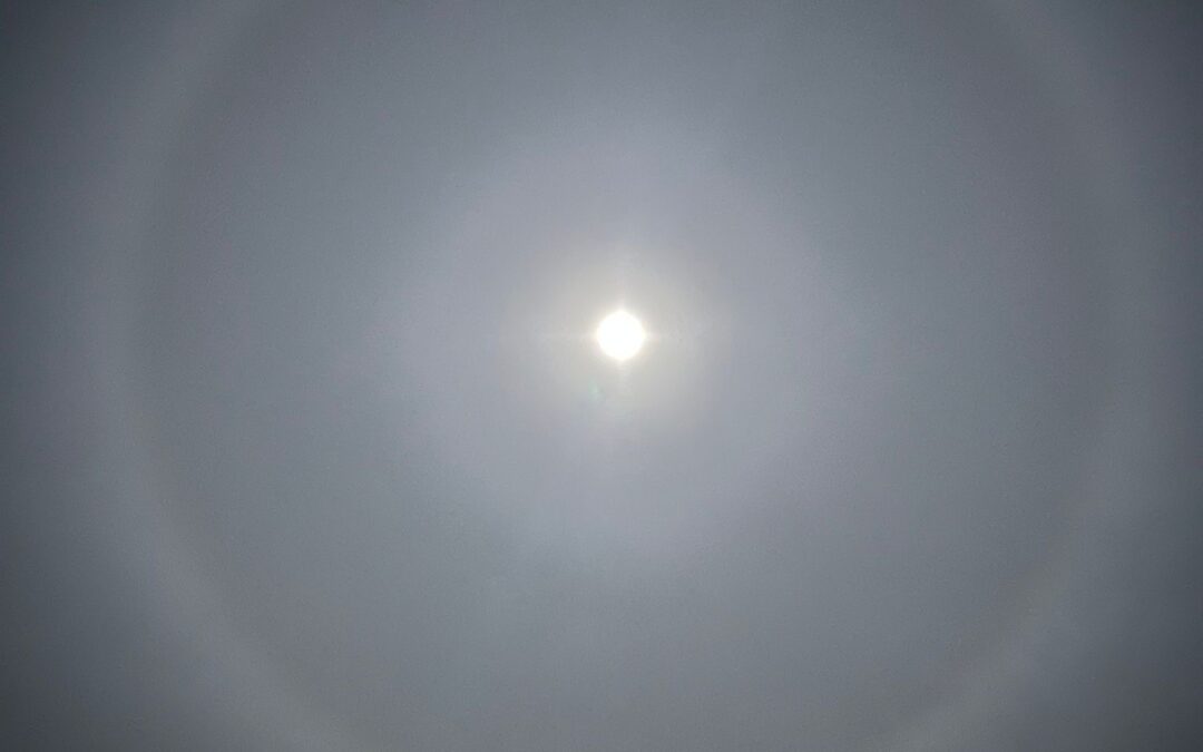 Circular halo around the moon, formed from ice crystals